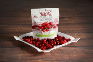 Mini lifestyle photo table top set-up with Dried Cranberries on wood