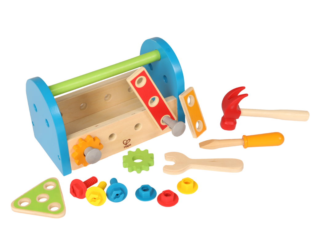 Product photo on transparent background of child wooden tool box in blue, red, green and yellow with toys spread out