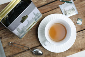 mini lifestyle photo of tea cup wood tabletop product photograph